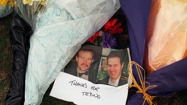 Flowers and tributes at the scene of the murder of Sergeant Gary Silk and Senior Constable Rodney Miller in 1998.