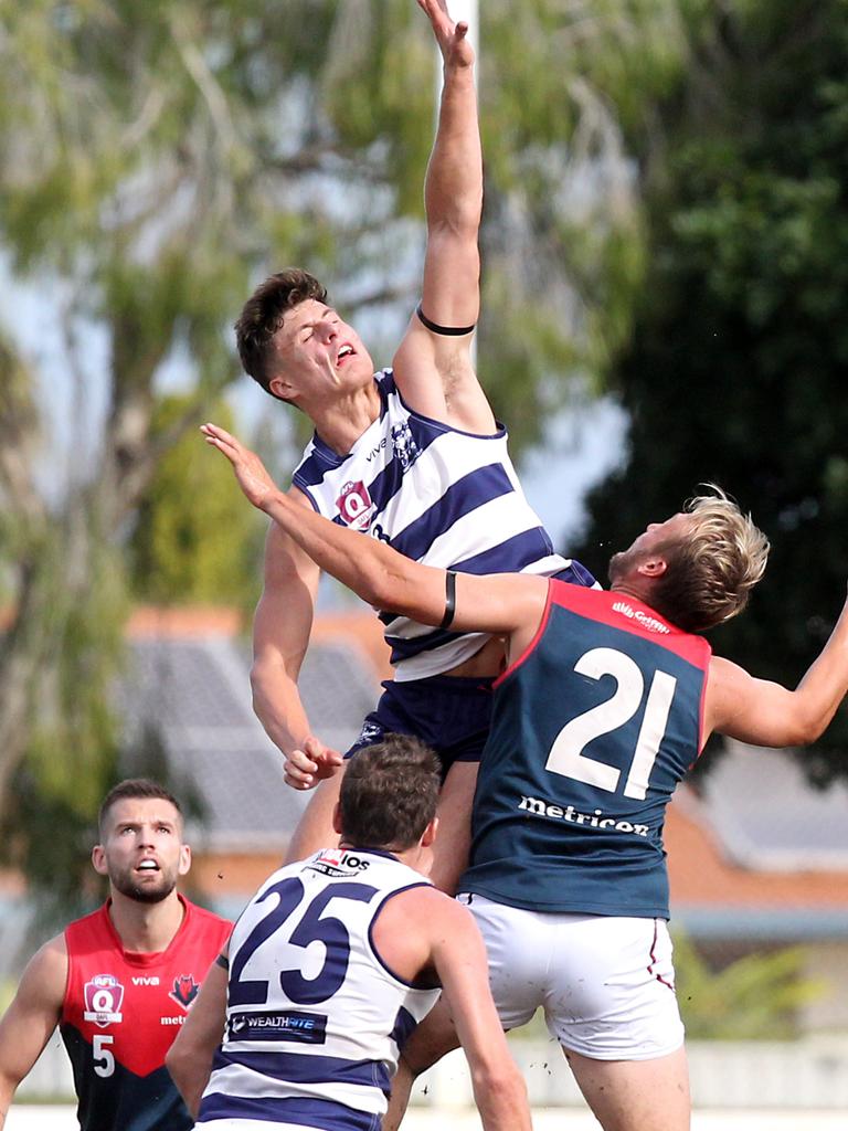 Round 6 QAFL game between Broadbeach and Surfers Paradise at Subaru Oval. Photo of Ryan Pickering gets some air in the ball up. 2 May 2021 Mermaid Waters Picture by Richard Gosling