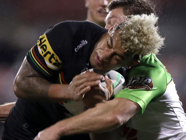 SYDNEY, AUSTRALIA - AUGUST 08:  Viliame Kikau of the Panthers is tackled during the round 13 NRL match between the Penrith Panthers and the Canberra Raiders at Panthers Stadium on August 08, 2020 in Sydney, Australia. (Photo by Mark Kolbe/Getty Images)