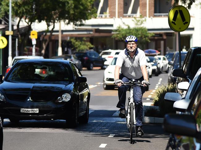 Phil Griffiths says the helmets would simply add to the cost of cycling.