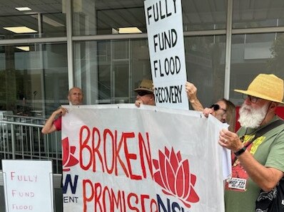 Protesters outside Janelle Saffin’s Lismore office.