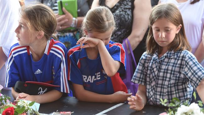 People of all ages paid their respects. Picture: Tony Gough