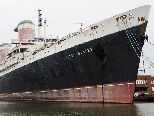 FILE -In this Nov. 22, 2013, file photo, the SS United States sits moored in Philadelphia. Officials of the Crystal Cruises luxury travel company held a news conference Thursday, Feb. 4, 2016 to announce plans to overhaul the SS United States at a cost of at least $700 million. (AP Photo/Matt Rourke, File)