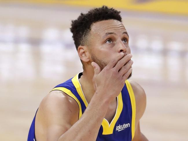 SAN FRANCISCO, CA - APRIL 12: Golden State Warriors' Stephen Curry reacts to passing Wilt Chamberlain as the franchise's leading career scorer after scoring a 1st quarter basket against Denver Nuggets during 1st quarter of NBA game at Chase Center in San Francisco, Calif., on Monday, April 12, 2021. (Scott Strazzante/The San Francisco Chronicle via Getty Images)