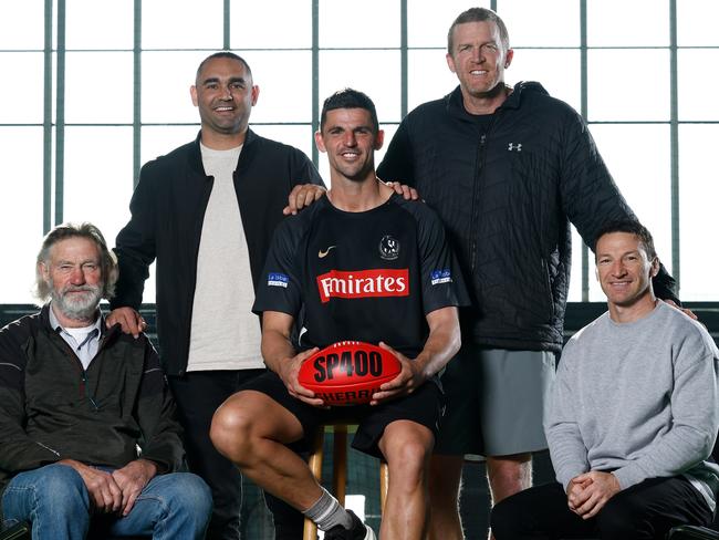 MELBOURNE, AUSTRALIA - JULY 31: 400 game players (L-R) Michael Tuck, Shaun Burgoyne, Scott Pendlebury, Dustin Fletcher and Brent Harvey (Kevin Bartlett absent) pose during the Collingwood Magpies Media Opportunity at the AIA Vitality Centre on July 31, 2024 in Melbourne, Australia. (Photo by Michael Willson/AFL Photos via Getty Images)