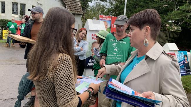 Independent candidate for Cowper Caz Heise talking with voters in Bellingen on election day. Picture: Janine Watson