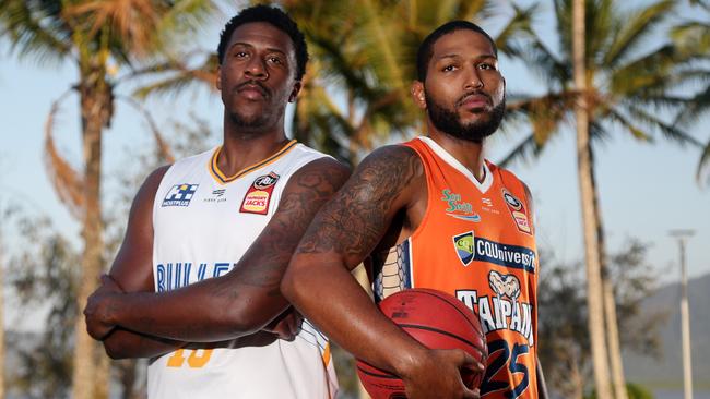 Brisbane Bullets' Lamar Patterson and Cairns Taipans DJ Newbill are ready to shape up on court in Cairns for the `Sunshine StoushÕ. PICTURE: STEWART MCLEAN