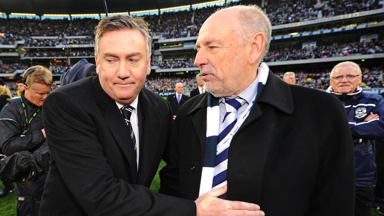 Collingwood president Eddie McGuire congratulates Geelong president Colin Carter after the Cats won the 2011 Grand Final.