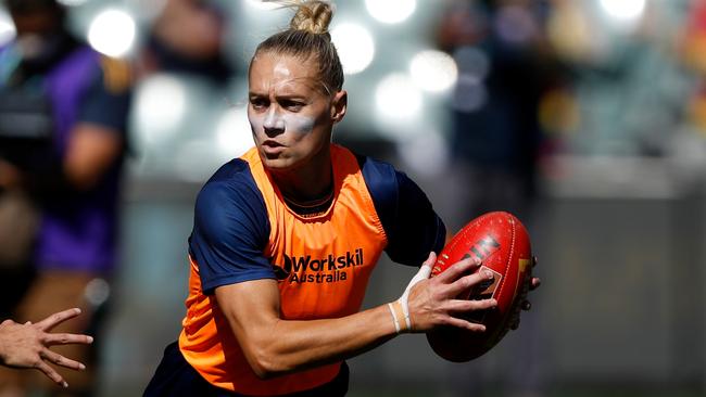 Erin Phillips warms up.