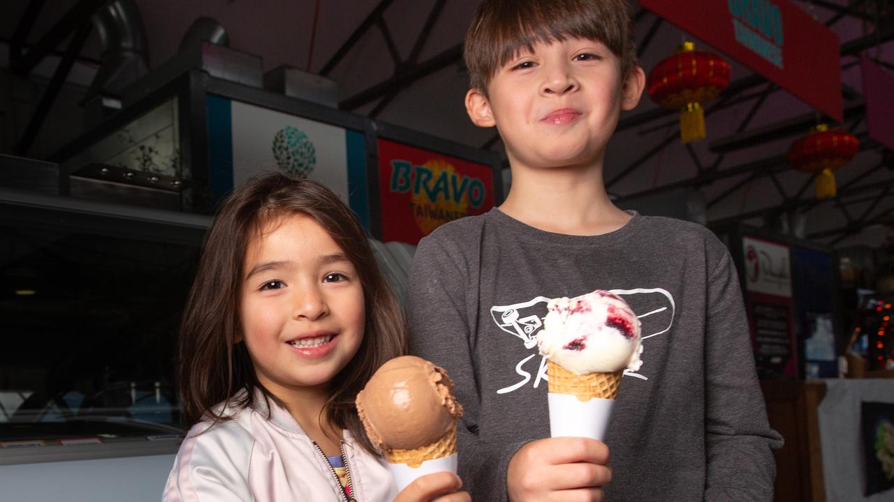 Canopy won the award for the best sweet treat or dessert with their Tongola Goats curd and Blackberry ice cream. Stallholders children Amy Brozek, aged 4, and Ethan Brozek, aged 7 with Dark Chocolate and Goats Curd and Blackberry Ice cream. Picture: Linda Higginson