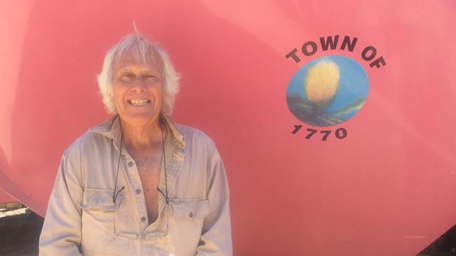 Bustard Head Lighthouse keeper since 1974, Stuart Buchanan with the 1770 LARC, which conducts tours to the lighthouse.