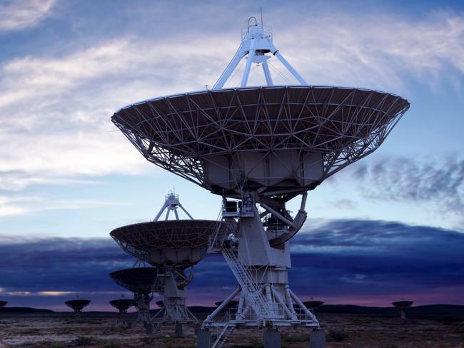 South Australia is poised to become one of the world's space industry capitals. Picture: iStock giant radio telescope satellite dishes at twilight, panoramic frame (XL)