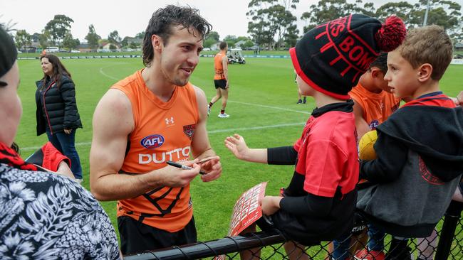 Andy McGrath meeting a fan at Essendon’s open training in December. Picture: Ian Currie