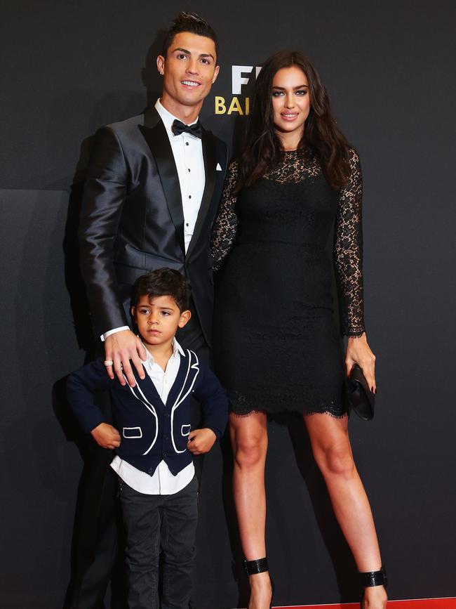 Cristiano Ronaldo, Irina Shayk and son Cristiano Ronaldo Junior. Photo by Alexander Hassenstein - FIFA/FIFA via Getty Images.