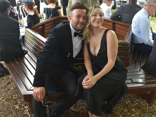 Guests in striking racewear at Penfolds Derby Day at the Flemington Racecourse on Saturday, November 02, 2024: Frank Carabott and Ally Ritchie. Picture: Jack Colantuono