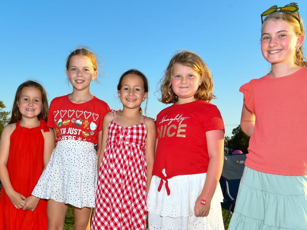 Lismore girls Lucy, Penny, Milli, Layla and Eadie enjoying the Christmas songs and playing on the grass with their friends.