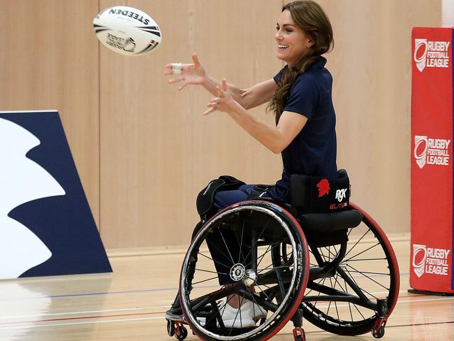 Princess Catherine tries wheelchair rugby as she joins a training session facilitated by members of the World Cup-winning England Wheelchair Rugby League. Picture: AFP