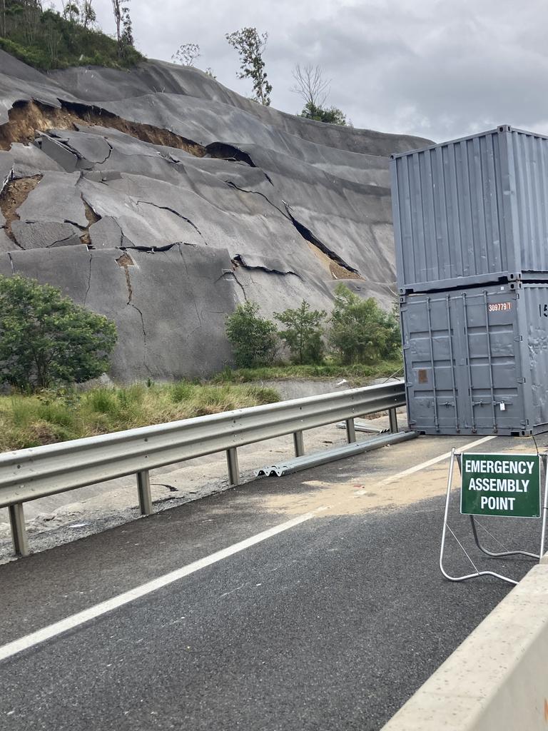 Large sections of concrete on two roadside cuttings collapsed on the Toowoomba Bypass following 12 months of above-average rain.