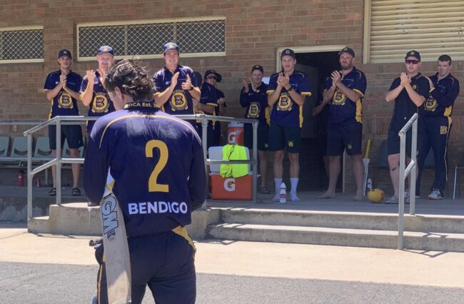 James Barri is congratulated by his teammates after he made a century. Picture: Bendigo District Cricket Association.