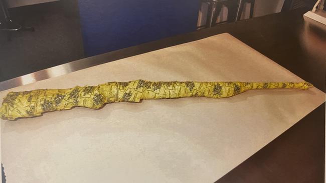 The wrapped firearm found in the shed of former Hells Angel Joshua Brougham. Picture: District Court