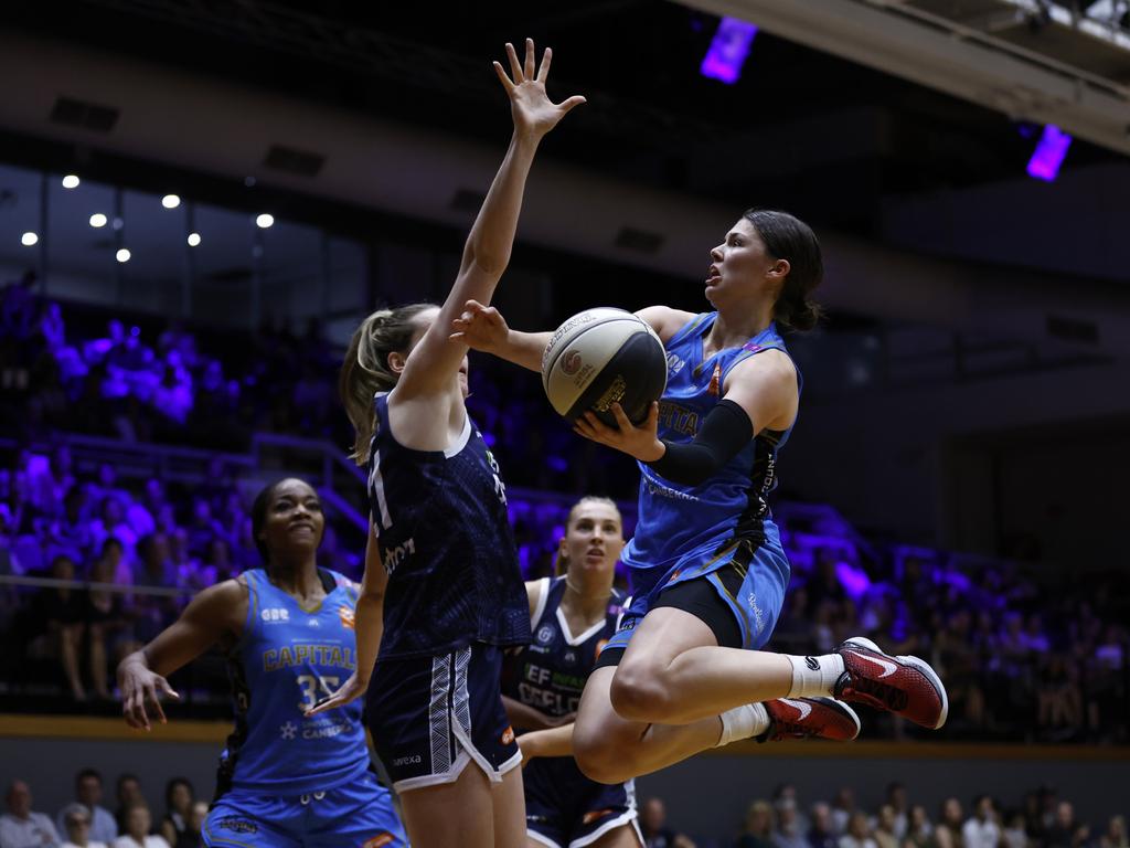 UC Capitals’ Jade Melbourne flies to the basket to eventually finish with a game-high 18 points. Picture: Darrian Traynor/Getty Images