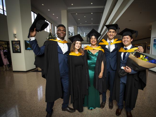 Kennedy Echetama, Linka Godejohann, Heena Nagi, Utkrisht Pahwa and Maurice Liaw at UTAS graduations held at the Hobart Grand Chancellor. Picture: LUKE BOWDEN
