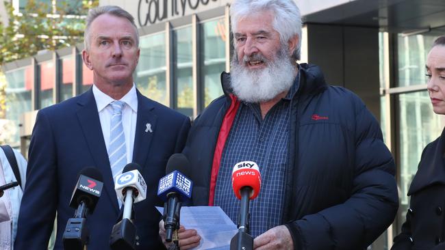 Senior Constable Lynette Taylor’s husband Stuart Schultz and partner of Senior Constable Kevin King, Sharron Mackenzie. Picture: NCA NewsWire / David Crosling