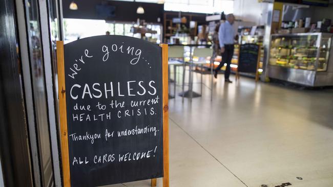 A cashless sign at a cafe during the COVID-19 pandemic. Picture: Glenn Hunt/The Australian