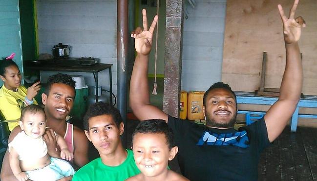 Kato Ottio with his family in PNG.