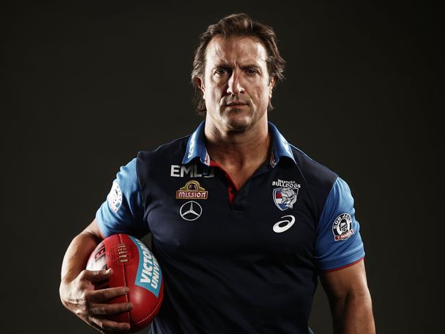 MELBOURNE, AUSTRALIA - MARCH 1: Luke Beveridge, coach of the Bulldogs poses for a photograph during the Western Bulldogs 2019 official team photo day at Whitten Oval on March 1, 2019 in Melbourne, Australia. (Photo by Scott Barbour/AFL Media)