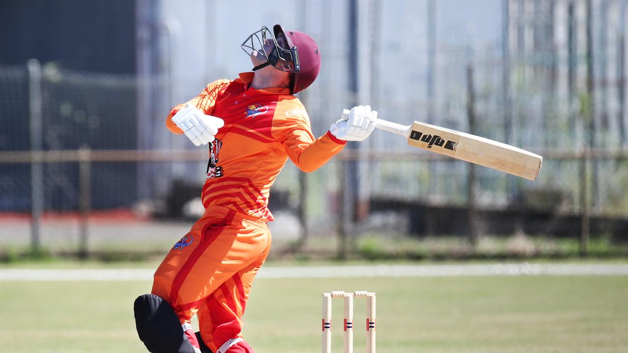 Badgers' Jake Roach hits the ball high in the T20 Barrier Reef Big Bash cricket match between the Designer First Homes Dare Devils and the Piccones Badgers, held at Griffiths Park, Manunda. Picture: Brendan Radke