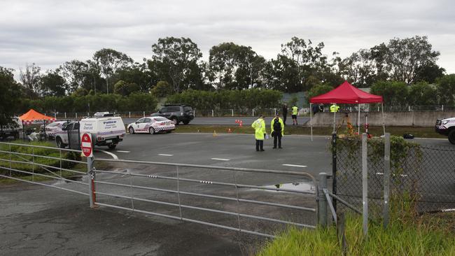 Police at the scene on the Bruce Highway. Photo Steve Pohlner