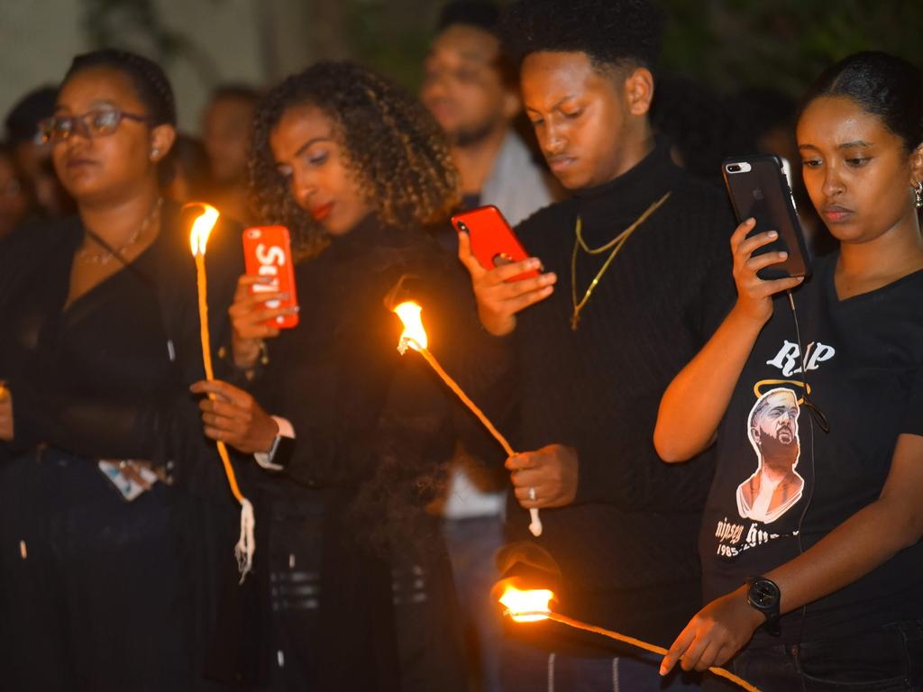 People take part in the memorial service to honour rapper, Nipsey Hussle. Picture: AFP