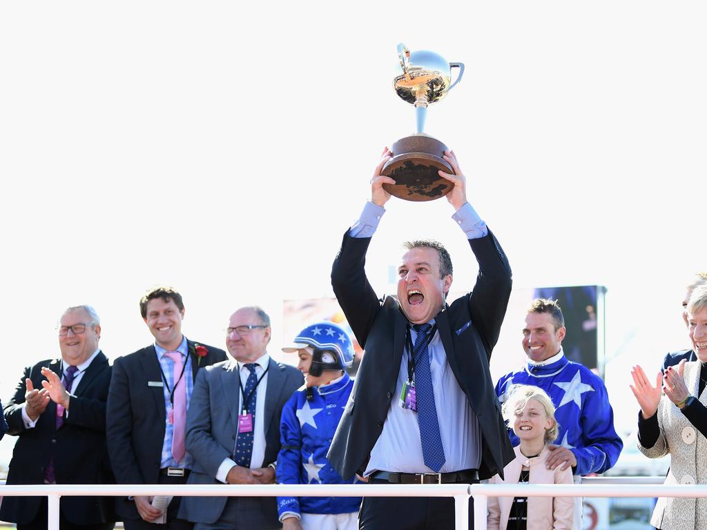 Geelong-based managing owner Danny Zavitsanos lifts the New Zealand Cup trophy. Picture: Getty Images