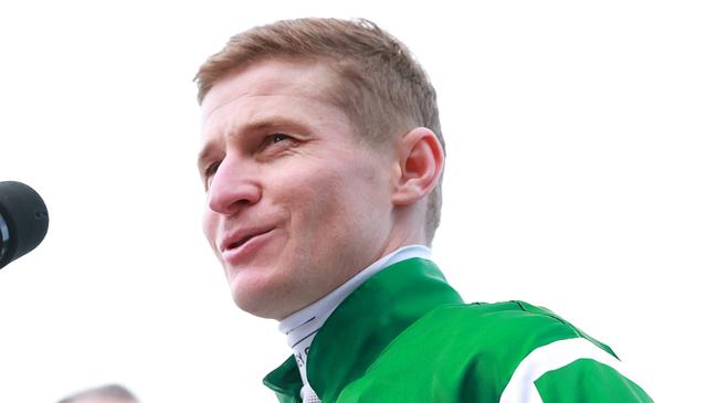 MELBOURNE, AUSTRALIA - OCTOBER 26: James McDonald speaks after riding Via Sistina (IRE) to win the Ladbrokes Cox Plate and his 100th Group 1 race during Cox Plate Day at Moonee Valley Racecourse on October 26, 2024 in Melbourne, Australia. (Photo by Kelly Defina/Getty Images)