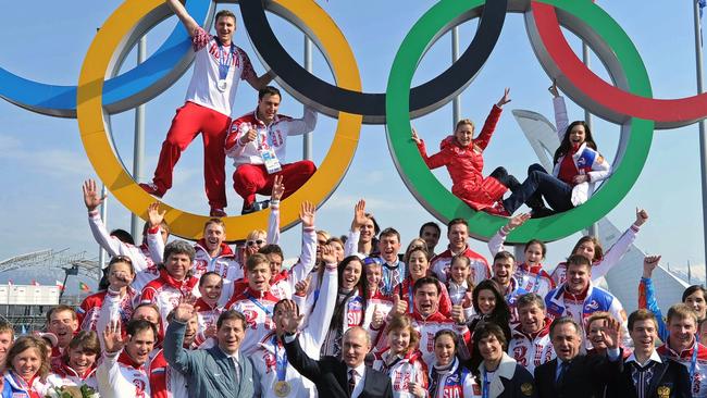 Vladimir Putin with Russian winners of the 2014 Sochi Olympics. Picture: AFP