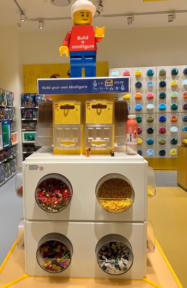 The LEGO certified store at Westfield Chermside includes a Build a Minifigure station and (at back) a Pick a Brick Wall. Picture: Michelle Smith