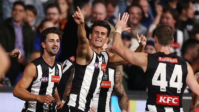 Nick Daicos celebrates the first goal of his AFL career against Geelong. Picture: Michael Klein