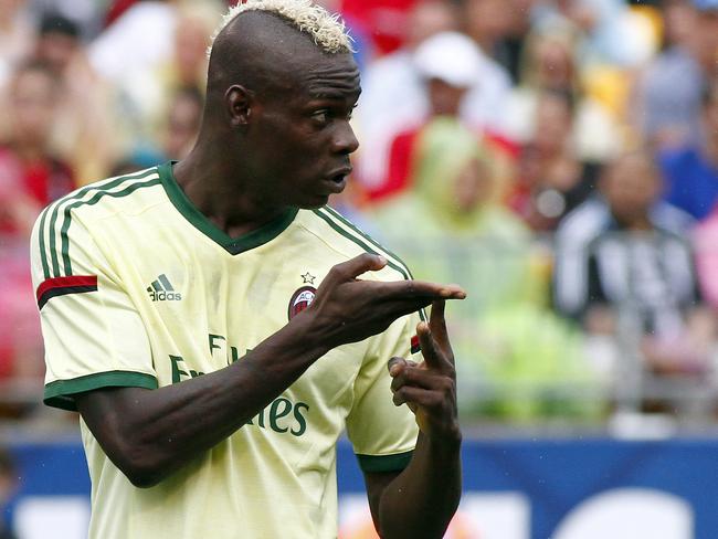 PITTSBURGH, PA - JULY 27: Mario Balotelli #45 of AC Milan signals to teammates against Manchester City during International Champions Cup 2014 at Heinz Field on July 27, 2014 in Pittsburgh, Pennsylvania. (Photo by Justin K. Aller/Getty Images)