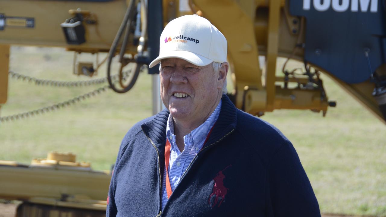 ALL SMILES: Wagner Corporation chairman John Wagner at the announcement a quarantine hub would be built at Wellcamp Airport, owned by the Wagners.