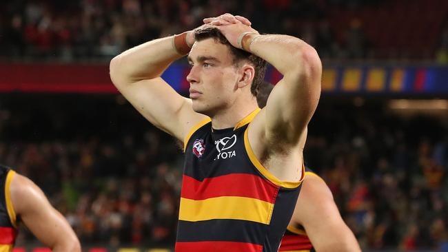 ADELAIDE, AUSTRALIA - AUGUST 19: Riley Thilthorpe of the Crows and Darcy Fogarty of the Crows after the loss during the 2023 AFL Round 23 match between the Adelaide Crows and the Sydney Swans at Adelaide Oval on August 19, 2023 in Adelaide, Australia. (Photo by Sarah Reed/AFL Photos via Getty Images)