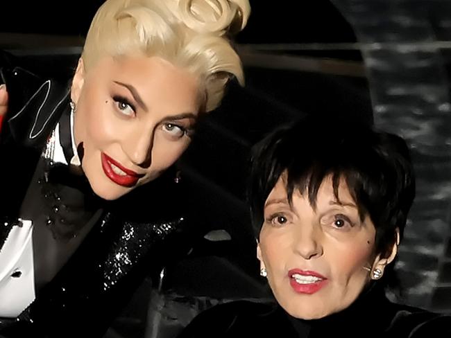 HOLLYWOOD, CALIFORNIA - MARCH 27: (L-R) Lady Gaga and Liza Minnelli speak onstage during the 94th Annual Academy Awards at Dolby Theatre on March 27, 2022 in Hollywood, California. (Photo by Neilson Barnard/Getty Images)