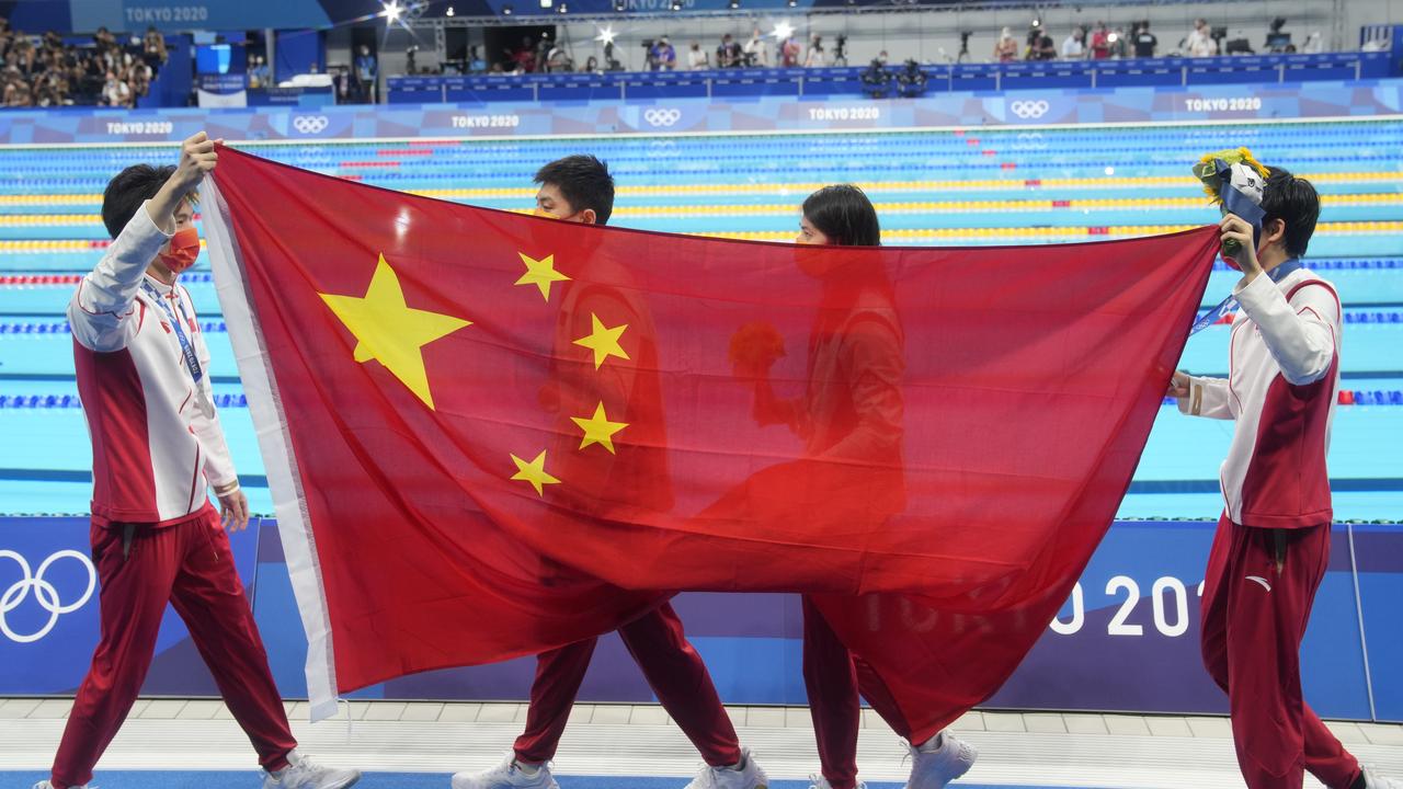 Silver medalists Xu Jiayu, Yan Zibei, Zhang Yufei and Yang Junxuan of Team China celebrate on the podium after the Mixed 4Ã&#151;100 metres medley relay on day eight of the Tokyo 2020 Olympic Games at Tokyo Aquatics Centre on July 31, 2021 in Tokyo, Japan. (Photo by Fred Lee/Getty Images)