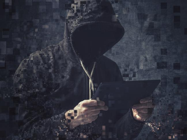 Pixelated unrecognizable faceless hooded cyber criminal man using digital tablet to access internet deep web page, p2p and piracy concept.