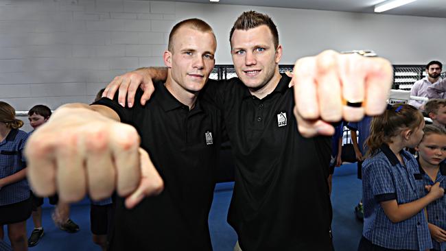 Jeff Horn and Liam Wilson at the PCYC with Ascot state school kids. Picture: Annette Dew