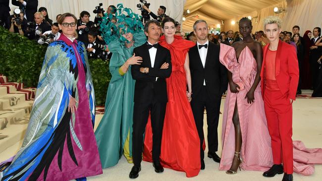 (R-L) Troye Sivan, Adut Akech, Adam Shulman, Anne Hathaway, Pierpaolo Piccioli, Frances McDormand and Hamish Bowles arrive for the 2018 Met Gala. Picture: AFP