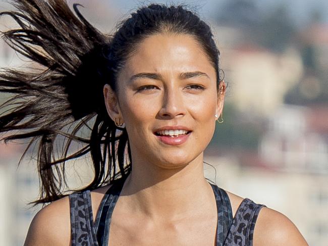 A Day In The Life Of Jessica Gomes. Jessica Gomes Daily routine starting moments after getting off a flight from LA. Including a Morning Work out with personal trainer on Bondi Beach. Picture: Jason Edwards.