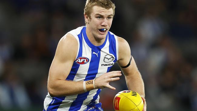 MELBOURNE, AUSTRALIA - AUGUST 20: Jason Horne-Francis of the Kangaroos runs with the ball during the round 23 AFL match between the North Melbourne Kangaroos and the Gold Coast Suns at Marvel Stadium on August 20, 2022 in Melbourne, Australia. (Photo by Daniel Pockett/Getty Images)