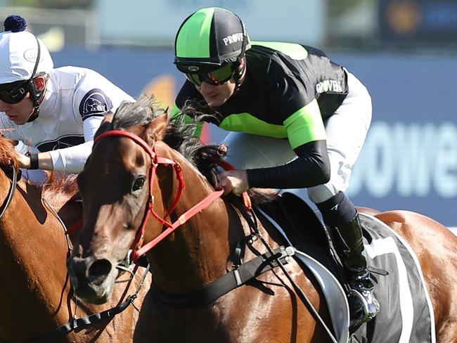 SYDNEY, AUSTRALIA - JANUARY 25: Reece Jones riding Cosmonova  win Race 7 Ranvet during Sydney Racing at Royal Randwick Racecourse on January 25, 2025 in Sydney, Australia. (Photo by Jeremy Ng/Getty Images)