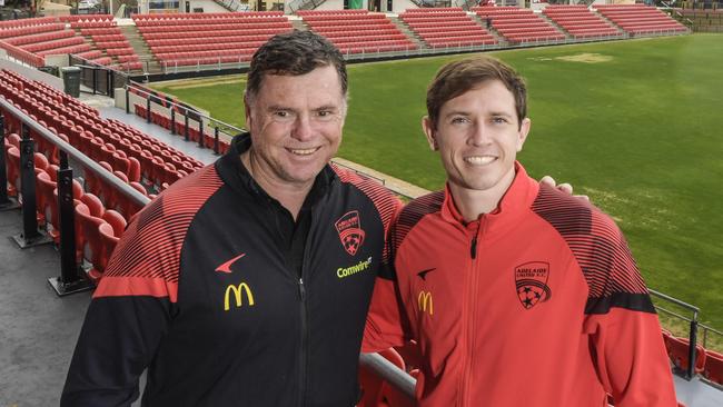 Adelaide United Craig Goodwin (R) signing announcement at Hindmarsh Stadium. Craig Goodwin (R) and coach Carl Veart (L)Friday 22 July 2022. Pic Roy VanDerVegt